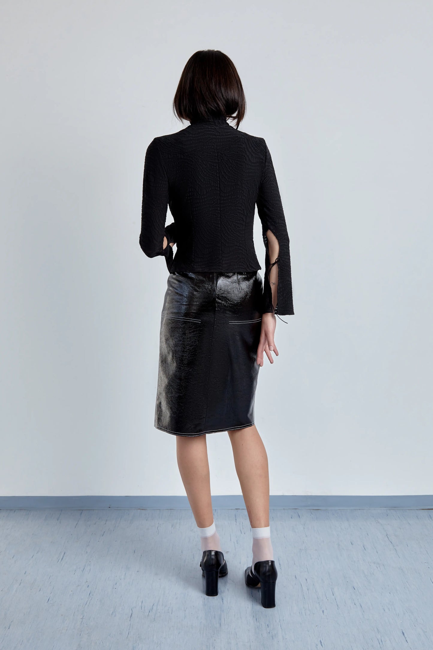 Black shiny leather skirt